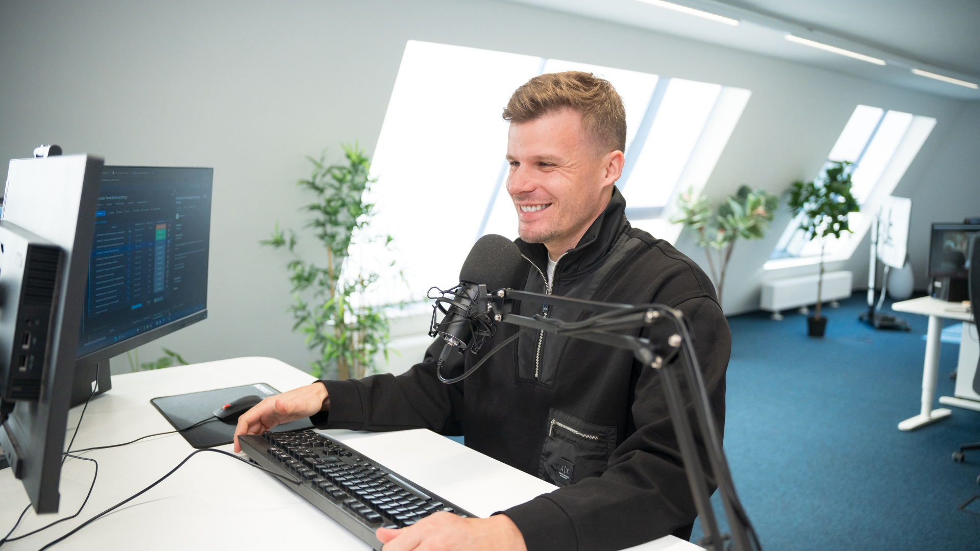Florian Semmler am Arbeitsplatz – KI-Sparring 1:1